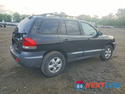 Trzecie zdjęcie samochodu z tyłu: 2005 HYUNDAI SANTA FE GLS VIN:KM8SC73EX5U865134 - miniatura