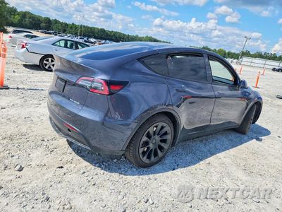 Trzecie zdjęcie samochodu z tyłu: 2021 TESLA MODEL Y VIN:5YJYGDEEXMF244529 - miniatura