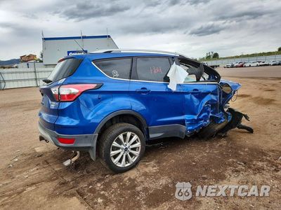 Trzecie zdjęcie samochodu z tyłu: 2017 FORD ESCAPE TITANIUM VIN:1FMCU9J95HUE35034 - miniatura
