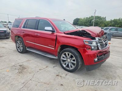 Czwarte zdjęcie samochodu z boku: 2015 CHEVROLET TAHOE C1500 LTZ VIN:1GNSCCKC2FR156450 - miniatura