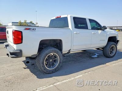 Trzecie zdjęcie samochodu z tyłu: 2016 CHEVROLET SILVERADO K1500 LT VIN:3GCUKREC8GG128642 - miniatura