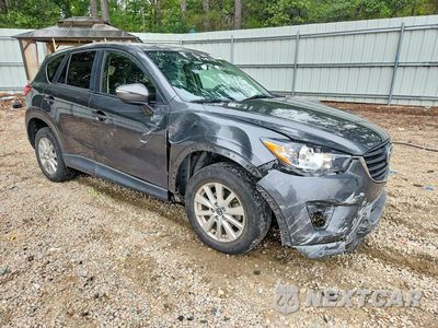 Czwarte zdjęcie samochodu z boku: 2016 MAZDA CX-5 TOURING VIN:JM3KE2CY1G0853189 - miniatura
