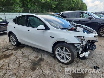 Czwarte zdjęcie samochodu z boku: 2023 TESLA MODEL Y VIN:7SAYGDEE5PF671608 - miniatura