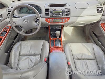 Zdjęcie 8 z 12 samochodu: 2003 TOYOTA CAMRY XLE VIN:4T1BE32K93U771575 - miniatura