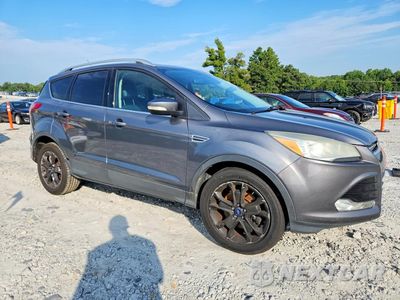 Czwarte zdjęcie samochodu z boku: 2018 FORD ESCAPE TITANIUM VIN:1FMCU9J90EUC86608 - miniatura