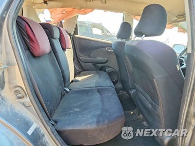 Zdjęcie 10 z 13 samochodu: 2011 HONDA FIT SPORT VIN:JHMGE8H56BS002081 - miniatura