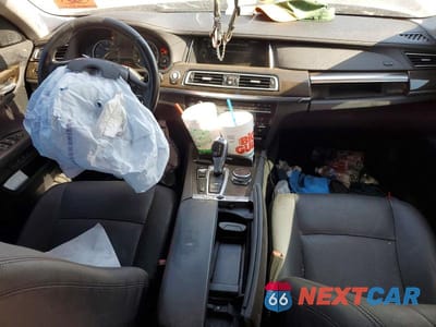Zdjęcie 8 z 12 samochodu: 2014 BMW 740 I VIN:WBAYA6C59ED144430 - miniatura