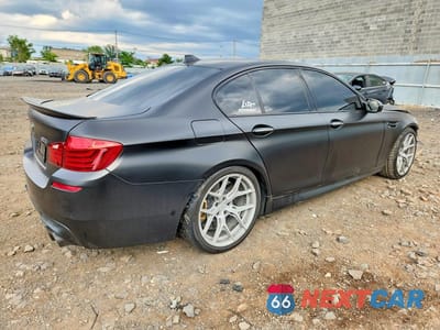 Trzecie zdjęcie samochodu z tyłu: 2015 BMW M5 M5 COMPETITION VIN:WBSFV9C56FD594773 - miniatura