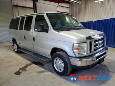Czwarte zdjęcie samochodu z boku: 2010 FORD ECONOLINE E150 WAGON VIN:1FMNE1BW7ADA05331 - miniatura