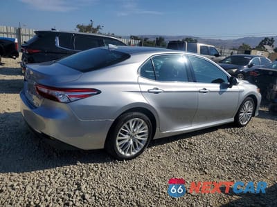 Trzecie zdjęcie samochodu z tyłu: 2019 TOYOTA CAMRY HYBRID VIN:4T1B21HK1KU517605 - miniatura