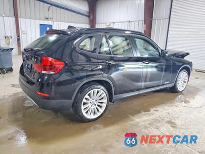 Trzecie zdjęcie samochodu z tyłu: 2013 BMW X1 XDRIVE28I VIN:WBAVL1C52DVR82811 - miniatura