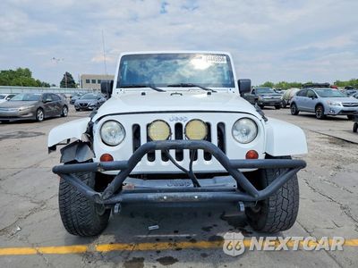 Piąte zdjęcie samochodu w środku: 2012 JEEP WRANGLER UNLIMITED SAHARA VIN:1C4HJWEG2CL214774 - miniatura