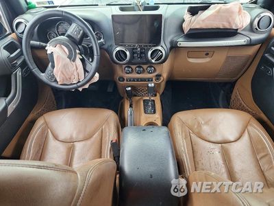 Zdjęcie 8 z 13 samochodu: 2016 JEEP WRANGLER UNLIMITED SAHARA VIN:1C4BJWEG3GL224872 - miniatura