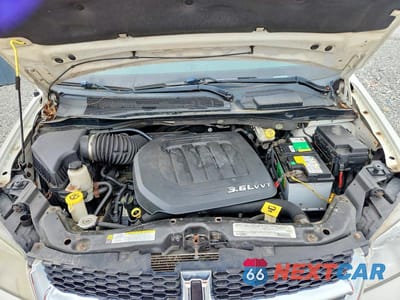 Zdjęcie 12 z 13 samochodu: 2012 DODGE GRAND CARAVAN SE VIN:2C4RDGBGXCR343861 - miniatura