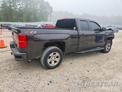 Trzecie zdjęcie samochodu z tyłu: 2018 CHEVROLET SILVERADO K1500 LT VIN:1GCVKREC4JZ172195 - miniatura