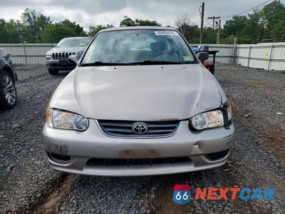 Piąte zdjęcie samochodu w środku: 2001 TOYOTA COROLLA CE VIN:1NXBR12E31Z546259 - miniatura