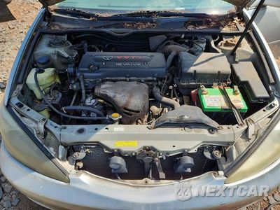 Zdjęcie 11 z 12 samochodu: 2004 TOYOTA CAMRY LE VIN:4T1BE32K24U901357 - miniatura