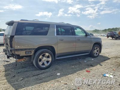 Trzecie zdjęcie samochodu z tyłu: 2017 CHEVROLET SUBURBAN K1500 PREMIER VIN:1GNSKJKC2HR248068 - miniatura