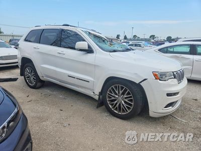 Czwarte zdjęcie samochodu z boku: 2018 JEEP GRAND CHEROKEE SUMMIT VIN:1C4RJFJG4JC139101 - miniatura