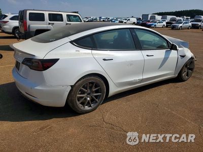 Trzecie zdjęcie samochodu z tyłu: 2021 TESLA MODEL 3 VIN:5YJ3E1EB0MF980030 - miniatura