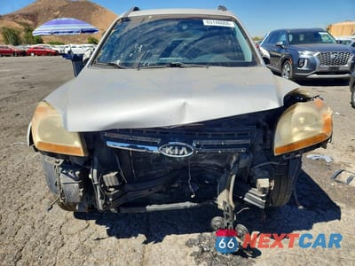 Piąte zdjęcie samochodu w środku: 2005 KIA SPORTAGE LX VIN:KNDJF723357046620 - miniatura