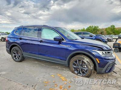 Czwarte zdjęcie samochodu z boku: 2023 VOLKSWAGEN TIGUAN SE VIN:3VV2B7AX9PM022384 - miniatura