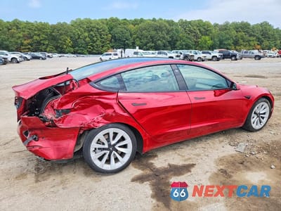 Trzecie zdjęcie samochodu z tyłu: 2023 TESLA MODEL 3 VIN:5YJ3E1EA7PF451816 - miniatura