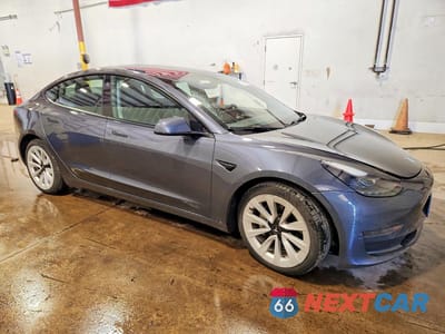 Czwarte zdjęcie samochodu z boku: 2023 TESLA MODEL 3 VIN:5YJ3E1EA6PF438359 - miniatura