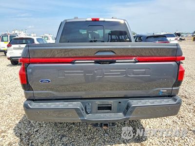 Zdjęcie 6 z 12 samochodu: 2022 FORD F150 LIGHTNING PRO VIN:1FT6W1EV7NWG03440 - miniatura