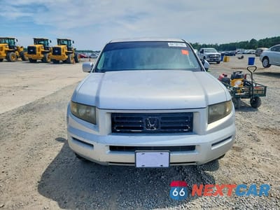 Piąte zdjęcie samochodu w środku: 2006 HONDA RIDGELINE RTS VIN:2HJYK16486H569076 - miniatura