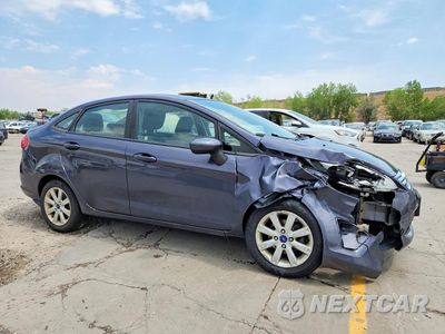 Czwarte zdjęcie samochodu z boku: 2012 FORD FIESTA SE VIN:3FADP4BJ2CM111392 - miniatura