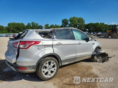 Trzecie zdjęcie samochodu z tyłu: 2014 FORD ESCAPE TITANIUM VIN:1FMCU9J9XEUE22291 - miniatura
