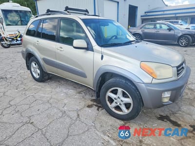 Czwarte zdjęcie samochodu z boku: 2001 TOYOTA RAV4 BASE VIN:JTEHH20V910105006 - miniatura