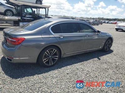 Trzecie zdjęcie samochodu z tyłu: 2018 BMW 740 XE VIN:WBA7J2C57JG938386 - miniatura