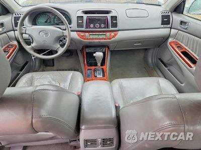Zdjęcie 8 z 12 samochodu: 2003 TOYOTA CAMRY XLE VIN:4T1BE30K13U253396 - miniatura