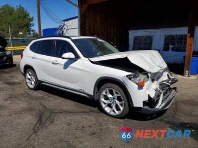 Czwarte zdjęcie samochodu z boku: 2013 BMW X1 XDRIVE35I VIN:WBAVM5C55DVV89051 - miniatura