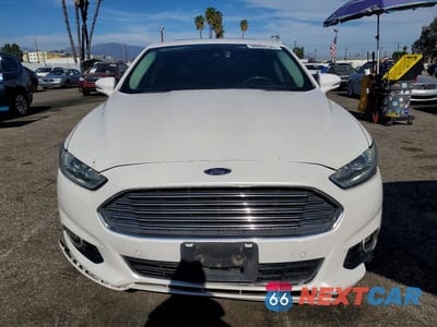Piąte zdjęcie samochodu w środku: 2016 FORD FUSION TITANIUM PHEV VIN:3FA6P0SU5GR157013 - miniatura