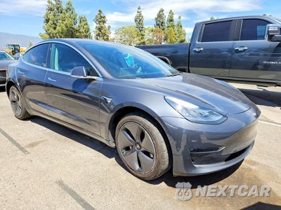 Czwarte zdjęcie samochodu z boku: 2018 TESLA MODEL 3 VIN:5YJ3E1EA0JF016398 - miniatura