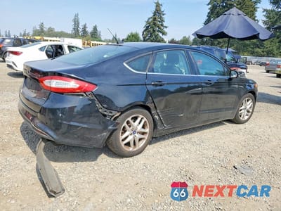 Trzecie zdjęcie samochodu z tyłu: 2016 FORD FUSION SE VIN:3FA6P0H74GR123422 - miniatura