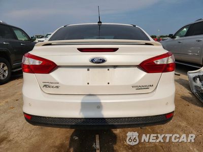 Zdjęcie 6 z 12 samochodu: 2013 FORD FOCUS TITANIUM VIN:1FADP3J21DL144732 - miniatura