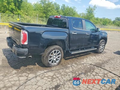 Trzecie zdjęcie samochodu z tyłu: 2017 GMC CANYON DENALI VIN:1GTG6EEN6H1191976 - miniatura