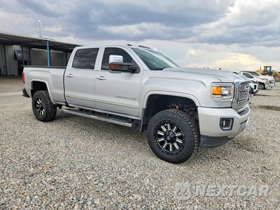 Czwarte zdjęcie samochodu z boku: 2019 GMC SIERRA K2500 DENALI VIN:1GT12SEYXKF223011 - miniatura