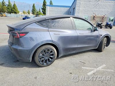 Trzecie zdjęcie samochodu z tyłu: 2023 TESLA MODEL Y VIN:7SAYGDEE9PF960426 - miniatura