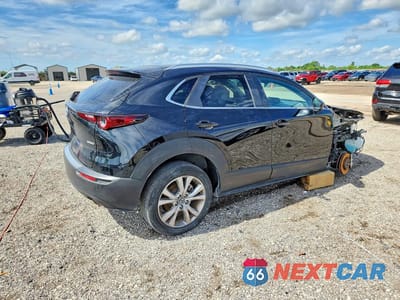 Trzecie zdjęcie samochodu z tyłu: 2024 MAZDA CX-30 PREFERRED VIN:3MVDMBCM9RM608267 - miniatura