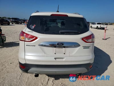 Zdjęcie 6 z 13 samochodu: 2014 FORD ESCAPE TITANIUM VIN:1FMCU0JX6EUC44471 - miniatura