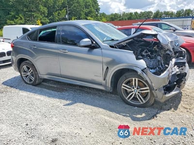 Czwarte zdjęcie samochodu z boku: 2019 BMW X6 XDRIVE35I VIN:5UXKU2C59K0Z65425 - miniatura