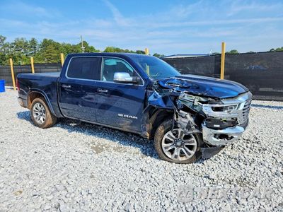 Czwarte zdjęcie samochodu z boku: 2022 RAM 1500 LONGHORN VIN:1C6SRFKT8NN439019 - miniatura
