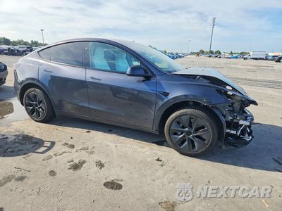 Czwarte zdjęcie samochodu z boku: 2024 TESLA MODEL Y VIN:7SAYGDED3RA327010 - miniatura
