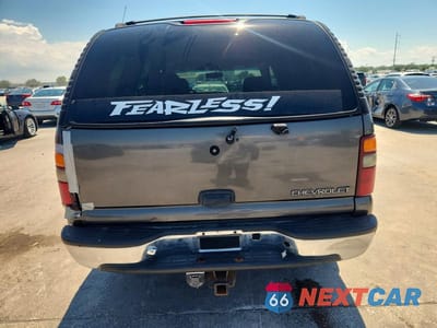 Zdjęcie 6 z 13 samochodu: 2001 CHEVROLET TAHOE C1500 VIN:1GNEC13T61R177908 - miniatura