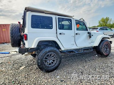 Trzecie zdjęcie samochodu z tyłu: 2015 JEEP WRANGLER UNLIMITED SAHARA VIN:1C4BJWEG2FL675502 - miniatura
